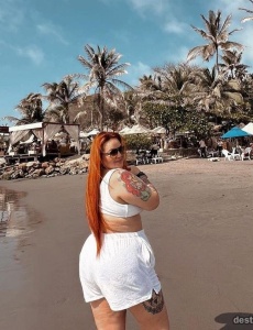Gordita con tatus